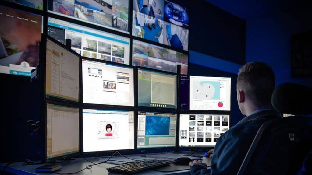 A safepoint alarm receiving centre employee reviewing safety data