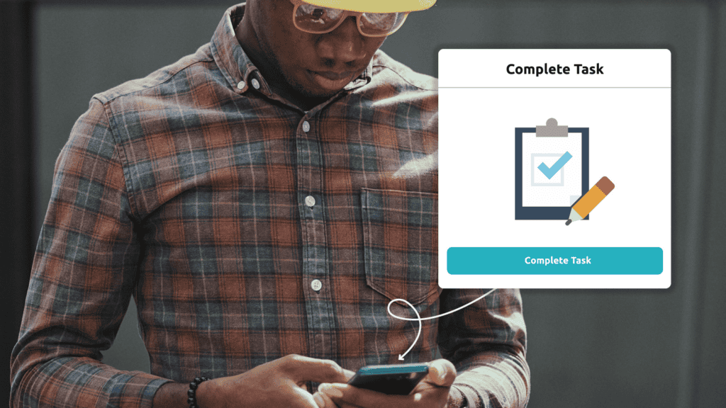 A construction worker completing his safety task in the Safepoint app with example app interface visible