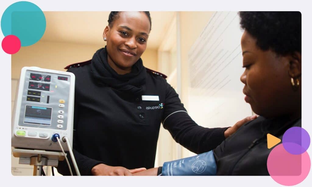 A nurse checking in on a patient