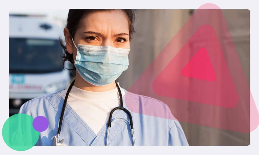 A healthcare worker with a triangle to symbolise raising the alarm on Safepoint