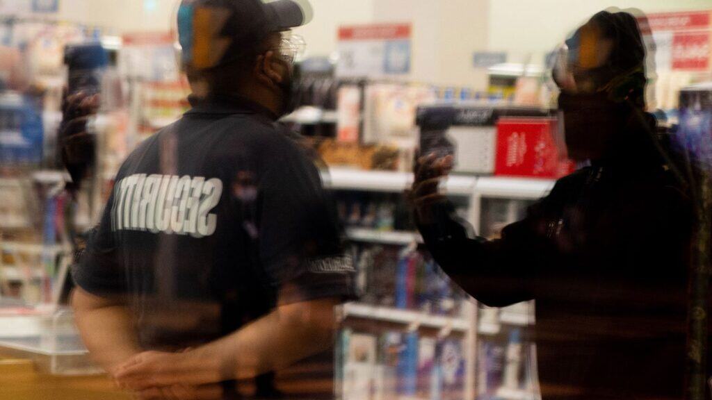 A security guard protecting a shop