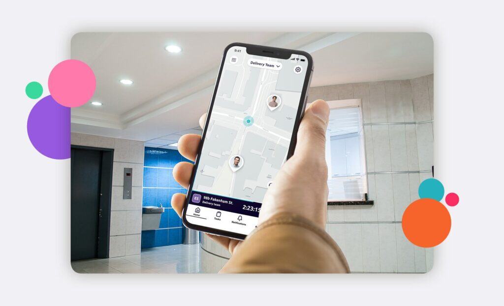 A hand holding a smartphone with the safepoint safety app open, whilst in a hospital