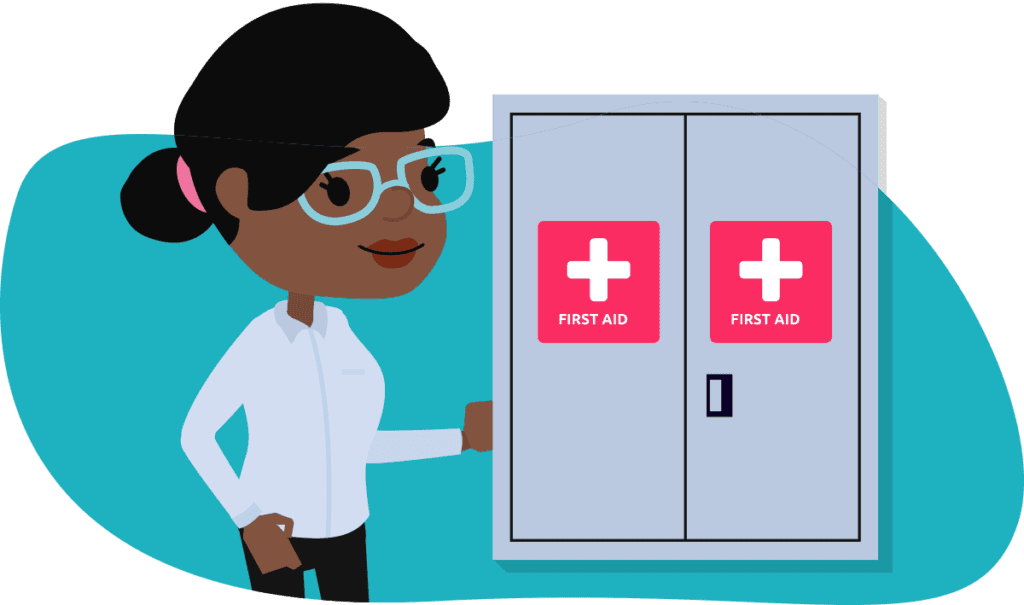 An employee standing at a first aid cupboard
