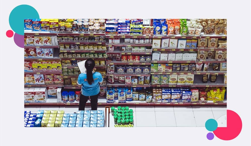 A lone staff member in a supermarket
