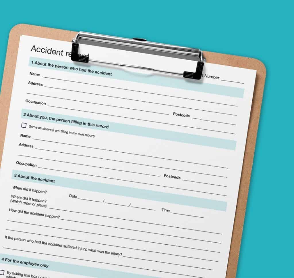 Safepoint's Free Accident Reporting Template shown on a clipboard