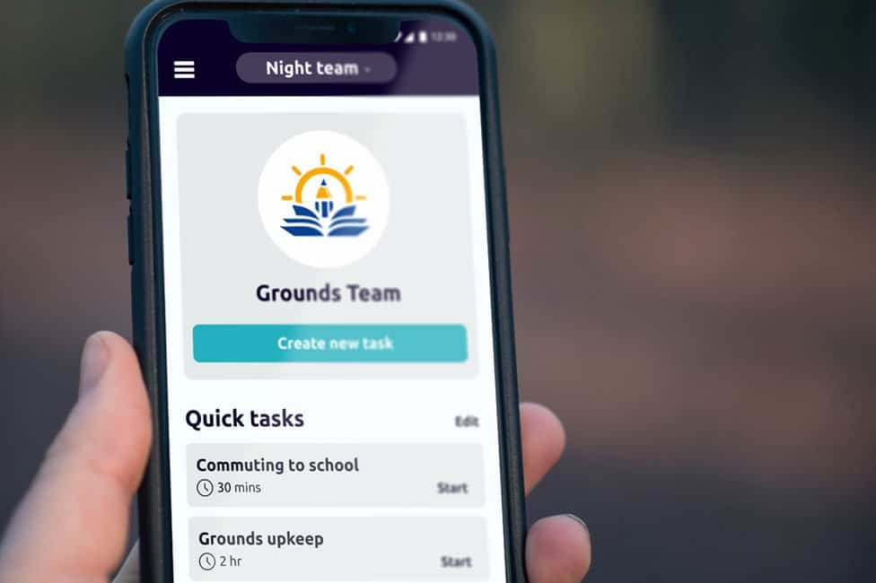 The ground maintenance team of a school using the safepoint app on their phone