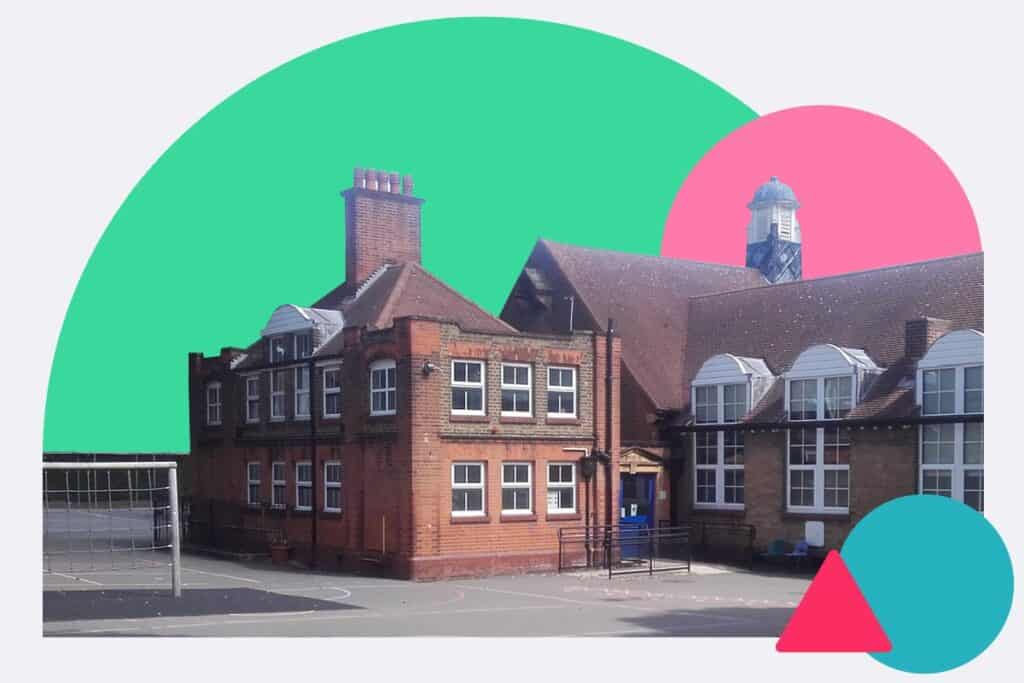A brick school building and playground