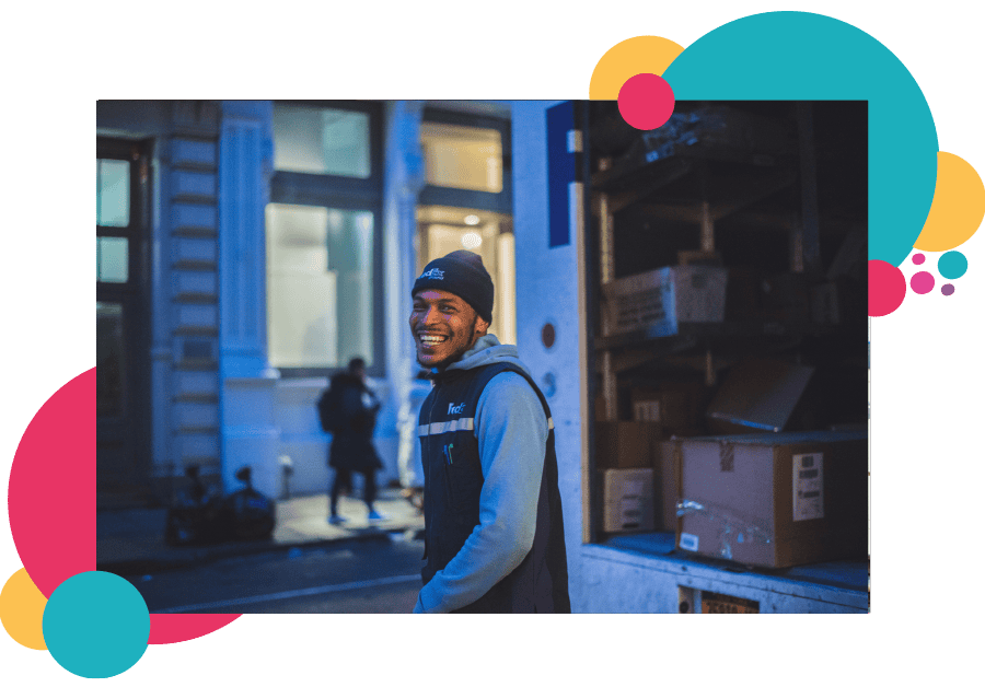 A lone working delivery driver at the back of his truck