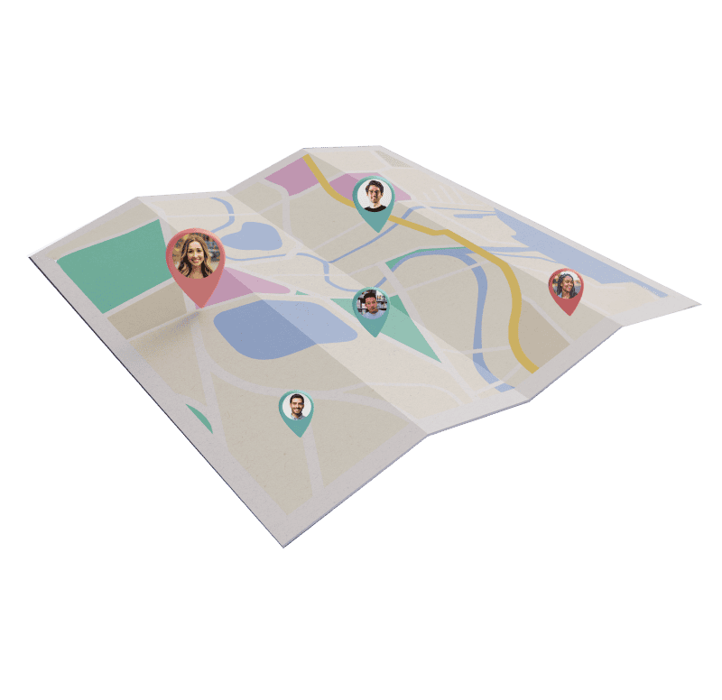 A paper map with location pins of employees